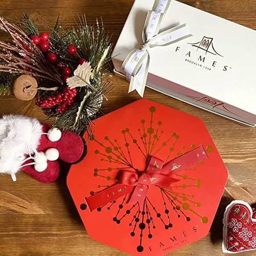 Vista 6 de Caja de nueces cubiertas de chocolate con caramelo, variedad surtida de nueces de chocolate, hamburguesas de nueces, almendras, racimos