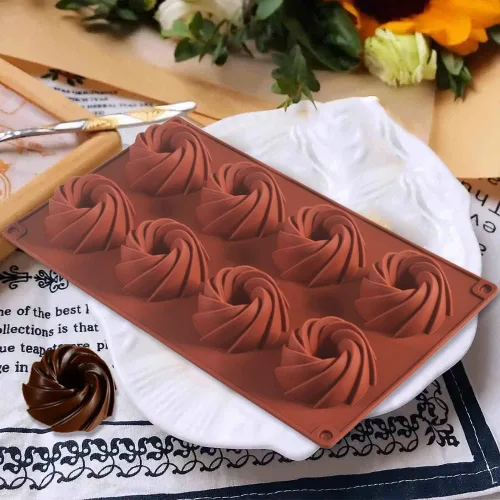 Vista 2 de ionEgg Molde de vórtice de silicona para hacer chocolate, dulces, pudín, galletas, paquete de 3