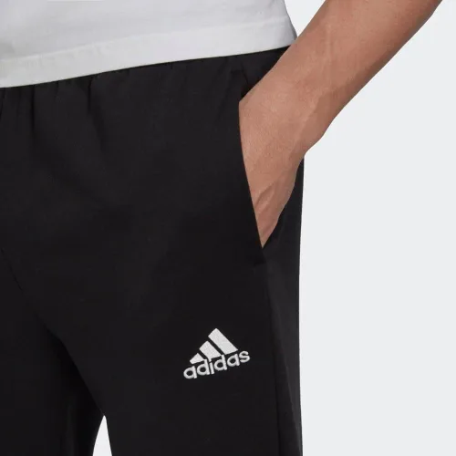 Vista 6 de adidas Pantalones cónicos regulares de forro polar Essentials para hombre