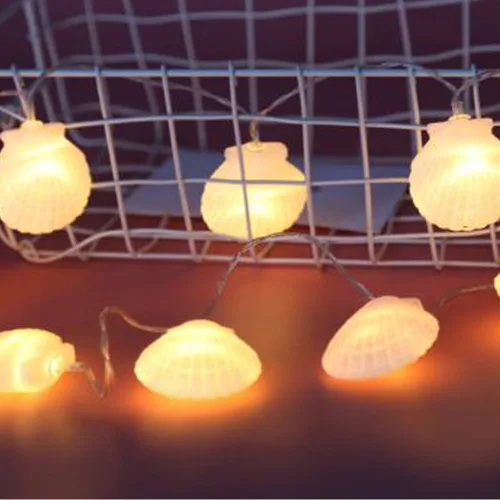 Vista 4 de Cadena de luces de concha, luz de carcasa de 5 pies con 10 LED, luces de cadena de conchas marinas alimentadas por pilas para Navidad, Halloween