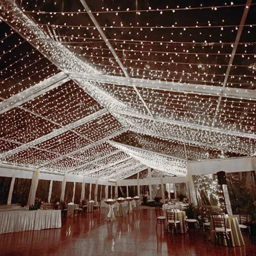 Vista 5 de Novelty Lights Guirnalda de luces de Navidad de 50 pies, 100 bombillas LED blancas puras en cable blanco, espacio de 6 pulgadas, iluminación Blanco