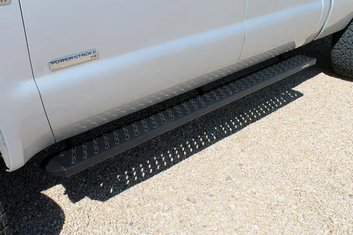 Vista 5 de Raptor Series Estribos Pasos 6.5in Ancho Sawtooth Grip Aluminio Negro Parte 2103-0344BT
