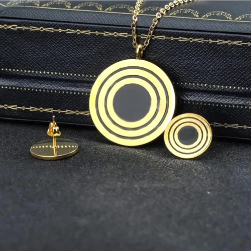 Vista 3 de MOXIE ACCESSORIES Juego de joyas de acero inoxidable con círculos dorados y negros para mujer, Acero inoxidable, No es una piedra preciosa
