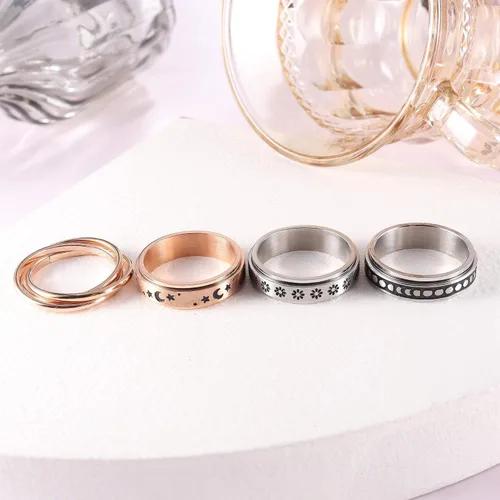 Vista 6 de FUNRUN JEWELRY Juego de 4 anillos giratorios de acero inoxidable para mujeres y hombres, anillos de banda para la ansiedad, luna, estrella, celta