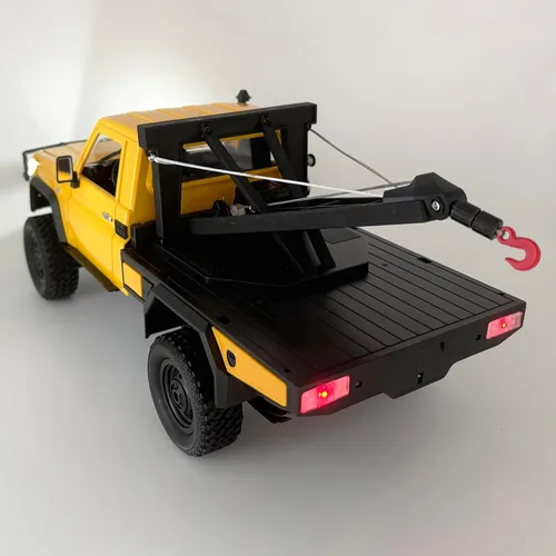 Vista 8 de HLSFWDRIVE RC Rock Crawler 4x4 MN82T RC Truck con gancho de grúa escala 1