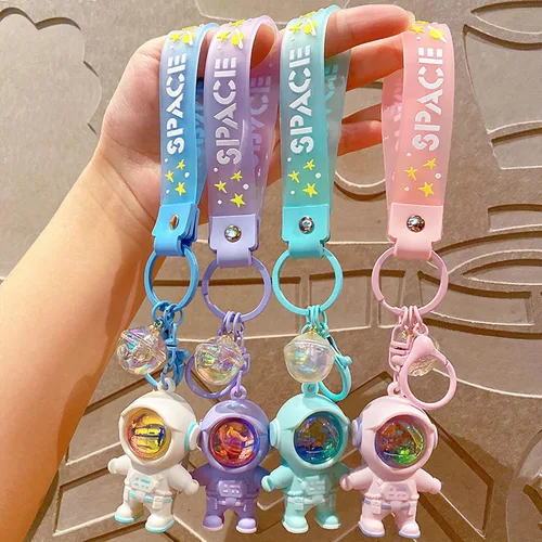 Vista 4 de KHIOPNT Cute Astronaut Keychains Space Key Chain with Sunset Light, Cool Outspace Keychains Pendant Car Keychains Wallet Gift
