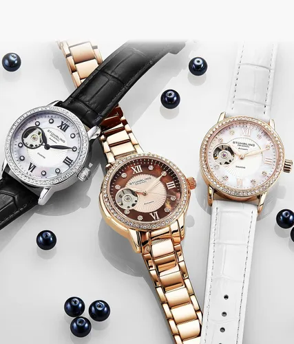 Vista 2 de Stuhrling - Reloj de vestir automático para mujer con bisel de cristal y movimiento automático de corazón abierto expuesto