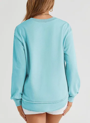 Vista 2 de EVALESS Sudadera para mujer, casual, color liso, cuello redondo, manga larga, abertura lateral, túnica de ajuste holgado
