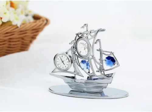 Vista 3 de Matashi Adorno de reloj de vela plateado cromado con cristales azules, elegante reloj de mesa para sala de estar o hogar, regalo de recuerdo