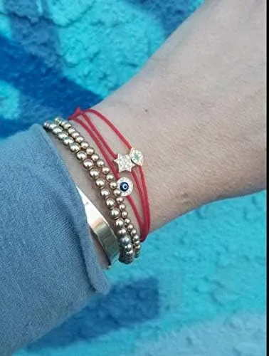 Vista 4 de Pulseras de protección roja con cierre ajustable y circonitas cúbicas sintéticas cuentas de estrella judía o mal de ojo