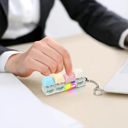Vista 4 de Juguetes de fidget de teclado para adultos, clicker de teclado con luz LED, llavero de juguetes sensoriales divertidos de fidget para ansiedad