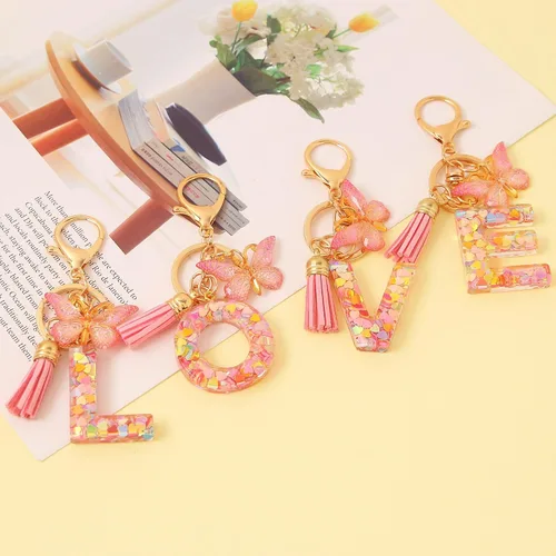Vista 6 de Llavero de Letra Inicial del Alfabeto de Moda con Borla y Colgante de Mariposa, Anillo de Llaves para Bolso, Carteras, Mujeres y Niñas