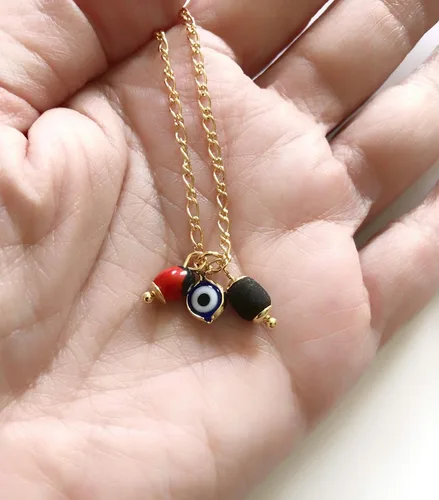 Vista 6 de SIFRIMANIA Tobilleras para mujer chapada en oro de 18 quilates, cadena Figaro de piedra azabache y dije contra el mal de ojo