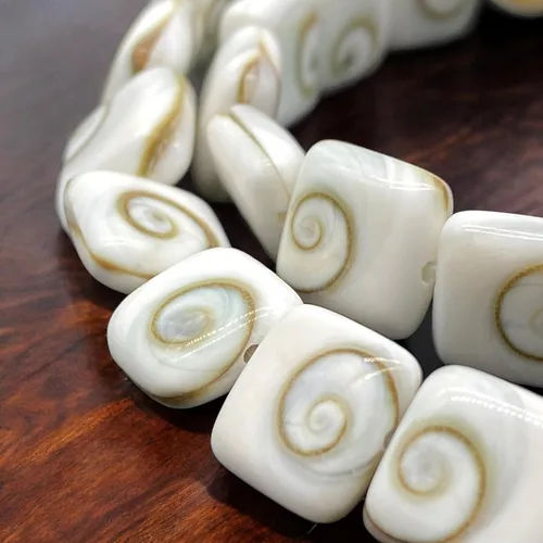 Vista 9 de ABCGEMS Shiva Eye Shell Beads Indonesia Auténtica Región Indo-Pacífico (patrón geométrico de matriz de doble cara) de origen ético – Producción