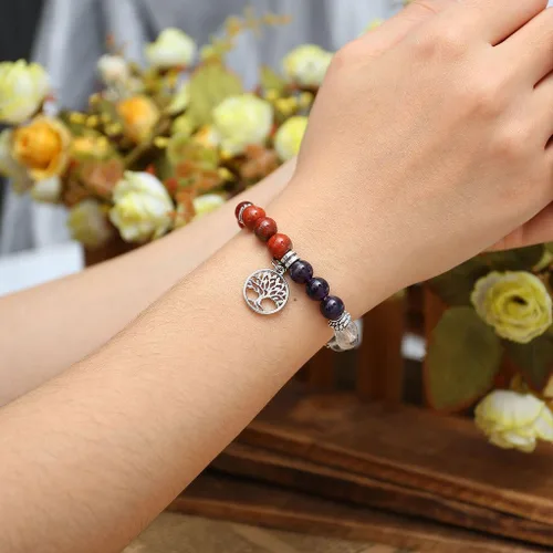 Vista 3 de JOVIV brazalete elástico de las 7 chakras con piedras preciosas y piedra de lava para balance de meditación y sanación yoga. cuenta de piedras