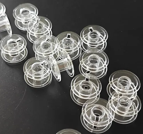 Vista 3 de HONEYSEW Bobinas de plástico transparente clase 15 para máquinas de coser cantantes (20 unidades/paquete)