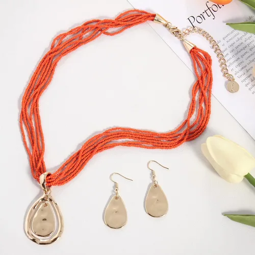 Vista 3 de Coiris Gargantilla de cuentas de semillas con dije de lágrima, collar de metal punk grueso para mujer, joyería