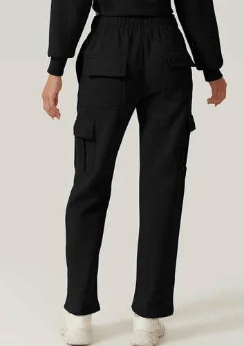 Vista 4 de QINSEN Pantalones deportivos holgados de cintura media para mujer, pantalones largos de forro polar con bolsillos