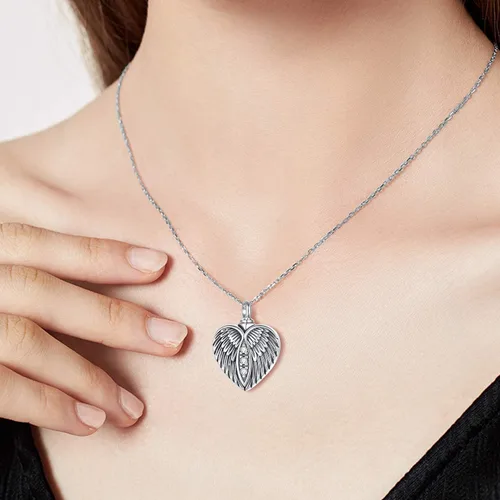 Vista 5 de Collar con urna de corazón con forma de alas de ángel, collar de cenizas y cremación