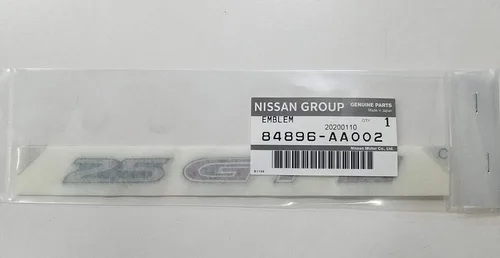 Vista 6 de NISSAN Emblema de pieza genuina Tapa de maletero Primera 4D Número de pieza 84890-50J60