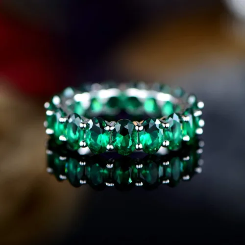 Vista 2 de Barzel Anillo de eternidad de piedras preciosas creadas para mujer, chapado en oro blanco de 18 quilates, corte ovalado, creado con piedras