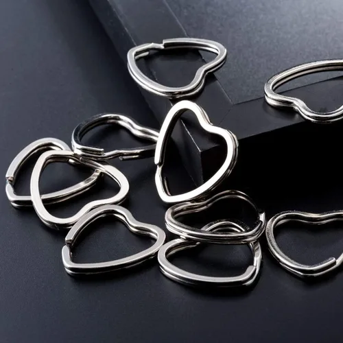 Vista 4 de 10 unids creativo llavero plano plata DIY metal llavero llavero aro bucle forma de corazón