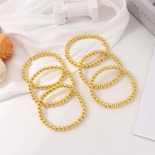 Vista 7 de MOZAKA 14 pulseras de cuentas de oro para mujer, chapados en oro de 14 quilates, pulsera elástica de oro para mujer, apilable