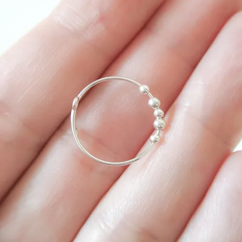 Vista 4 de Anillo de plata de ley para aliviar el estrés y la ansiedad, anillo giratorio ajustable con cuentas de metal
