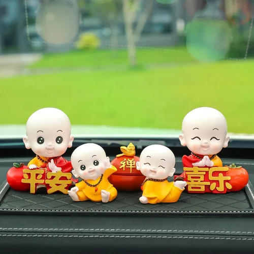 Vista 2 de Bonita estatua de monje bebé, figura de resina de monje de hoja de loto, figura de Buda en miniatura china para decoración del automóvil del hogar