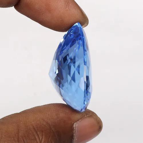 Vista 3 de REAL-GEMS 90.50 Ct topacio azul en forma de pera utilizado para la fabricación de joyas, Gema, hidrotermal - topacio azul