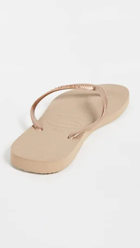 Vista 4 de Havaianas - Sandalia delgadas con diseño de la Mujer Maravilla para mujer, Oro Rosa