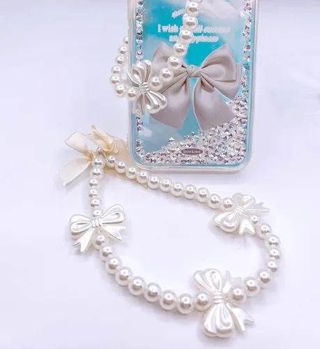 Vista 3 de Correa de muñeca con cordón para teléfono celular, con cuentas con lazo y perlas hechas a mano, llavero de cadena para mujeres y niñas