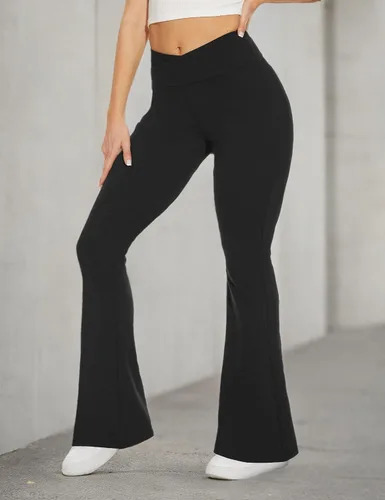 Vista 5 de TNNZEET Leggings acampanados negros para mujer, pantalones de yoga cruzados con bolsillos, corte de bota, leggings acampanados