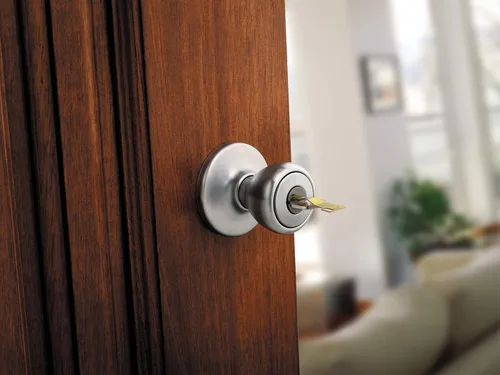 Vista 2 de Kwikset picaporte cromado con cerradura