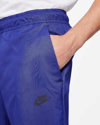 Vista 3 de Nike Ropa deportiva NSW - Pantalones para hombre tejidos cónicos ligeros CU4483-455 talla M, azul rey intensonegro , Mediana