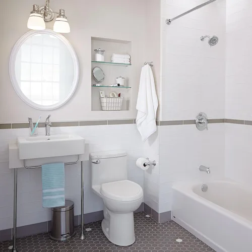Vista 3 de American Standard 612AA001.020 Compact Cadet 3, inodoro de una pieza con asiento de cierre lento y anillo de cera, parte delantera alargada, Blanco