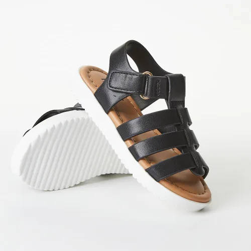 Vista 4 de FabKids Sandalias de gladiador para niñas, sandalias planas de tiras trenzadas, sandalias de verano con punta abierta, zapatos de vestir