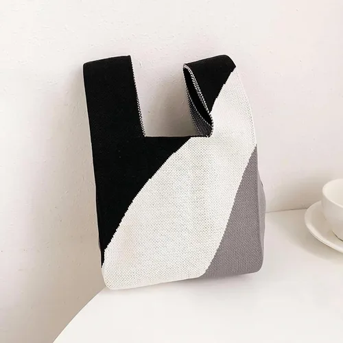 Vista 3 de Bolso pequeño con nudo de muñeca para mujer Tricolor negro.