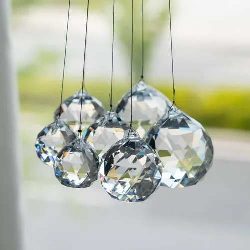 Vista 8 de HDCRYSTALGIFTS 12 atrapasoles de bola de cristal transparente, 1.18 pulgadas, cristales colgantes de prisma Feng Shui, lámpara colgante de gota