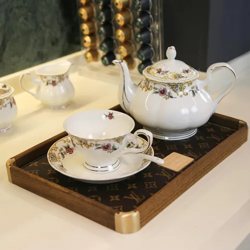 Vista 3 de ACMLIFE Juego de té de porcelana de hueso para adultos, juego de té de porcelana fina blanca y floral de 21 piezas, juego de 6 tazas de té inglés