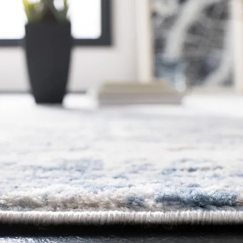 Vista 4 de SAFAVIEH Amelia Collection ALA700A - Alfombra decorativa de 2'2" x 4', diseño moderno abstracto, color marfil y azul, no desprende pelusa y de fácil