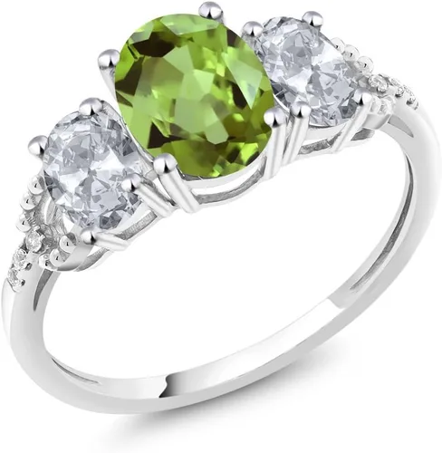 Vista 32 de Anillo de compromiso ovalado de oro blanco de 10 quilates con piedra natal y topacio blanco de 3 piedras con detalles de diamante Centro de 0.315