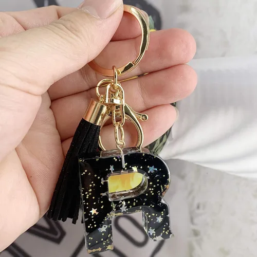 Vista 4 de SELOVO Llavero con inicial, letra negra, alfabeto y borla, llavero para bolso