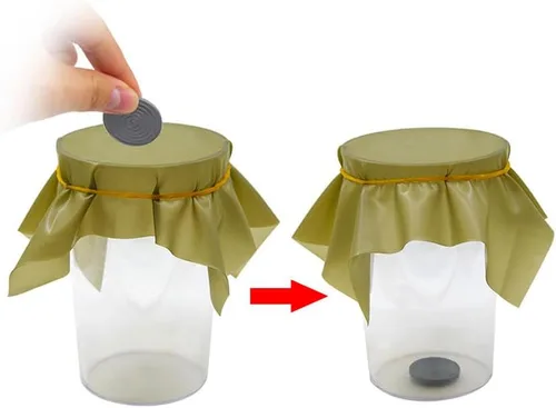 Vista 2 de blue-ther 1pc Pena Coin Penetración Trucos de magia Moneda a través de hoja de goma en la taza Magia Primer plano ilusiones truco accesorios