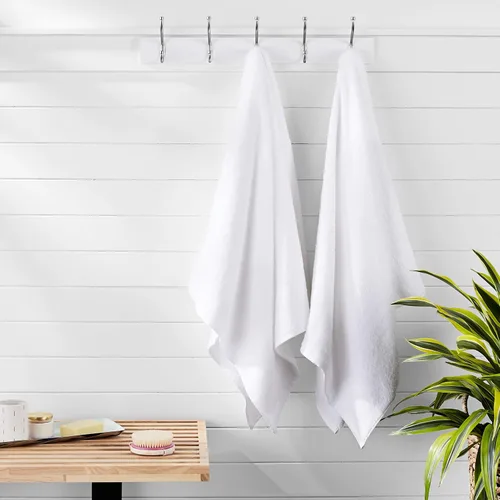 Vista 8 de Amazon Basics 2 toallas de baño de gran tamaño de secado rápido, 100% algodón, color blanco, de 62 x 30 pulgadas