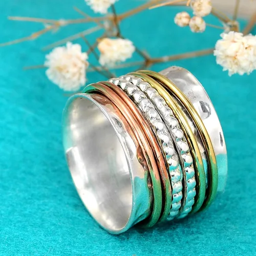 Vista 5 de Boho-Magic Anillo giratorio de plata de ley 925 con anillos antiestrés de latón y cobre para mujer de banda ancha