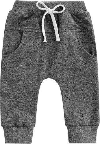 Vista 10 de Mubineo Pantalones deportivos básicos lisos para bebés, niños y niñas, cómodos pantalones de algodón con bolsillos Marrón