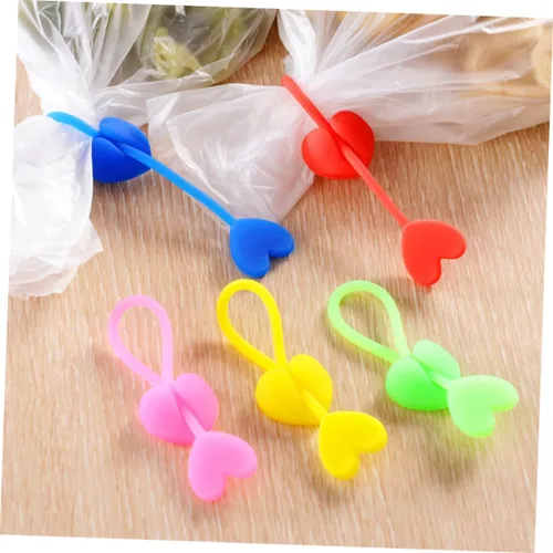 Vista 7 de STOBAZA Juego de 5 lazos reutilizables con forma de corazón de silicona, clip para pan, fácil de usar al azar