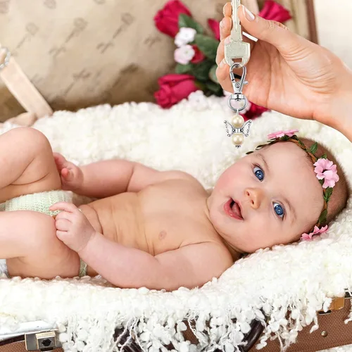 Vista 2 de Hicarer 100 llaveros de ángel con perlas de ángel, llavero de bautismo, regalos de devolución de invitados, llaveros para niñas y niños, baby