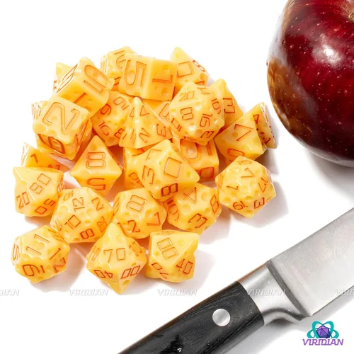 Vista 2 de Juego de dados de queso D&D (color amarillo claro y naranja nachos) con agujeros suizos DND/TTRPG Juego de 7 piezas de resina poliédrica